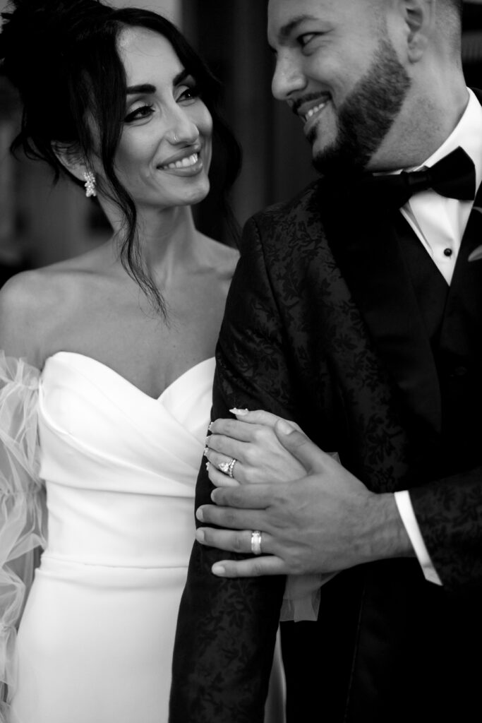 Bride and groom pose for formal portraits during their wedding at Naples Bay Resort in Naples, Florida. 