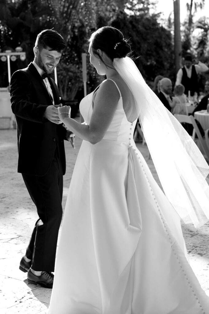 Bride and groom celebrating their wedding at the Alderman House