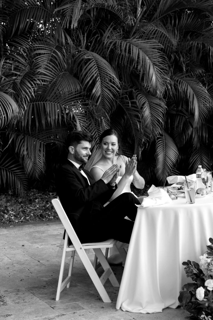Bride and groom celebrating their wedding at the Alderman House
