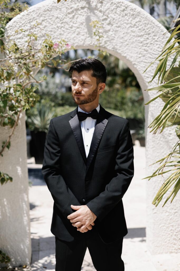 Groom portrait of him getting ready at the Alderman House wedding venue in Florida