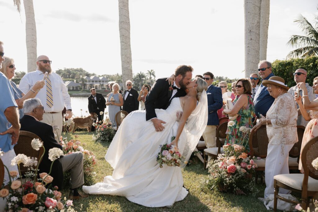 Elegant Port Royal Wedding | Priscila Del Cristo Photo Bride and groom share kiss as groom dips bride at timeless port royal wedding.