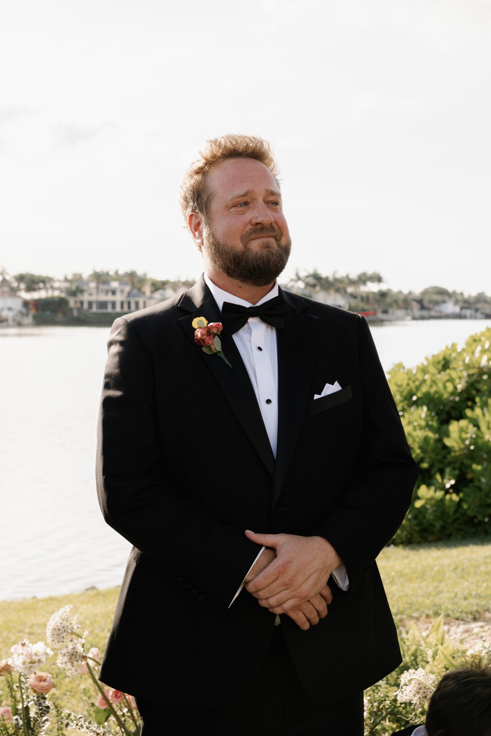 Elegant Port Royal Wedding | Priscila Del Cristo Photo Groom watching bride come down aisle at Naples' Port Royal wedding.