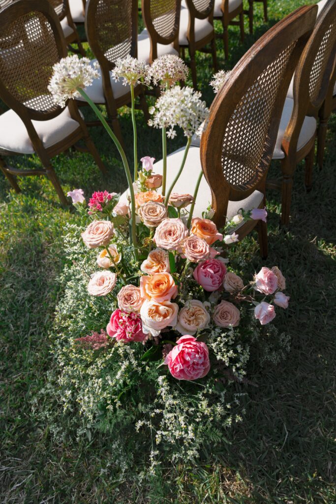 Port Royal Naples FL | Priscila Del Cristo Photo Outdoor ceremony set up with vintage chair and peonies at port royal naples florida private residence.