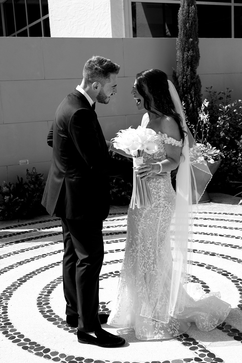 the bride and groom at their naples beach hotel and golf club wedding