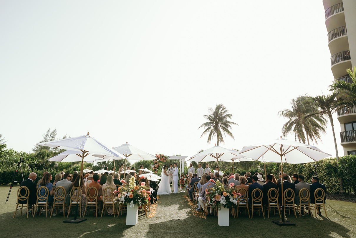 naples beach and hotel golf club resort wedding ceremony photo of the bride and groom