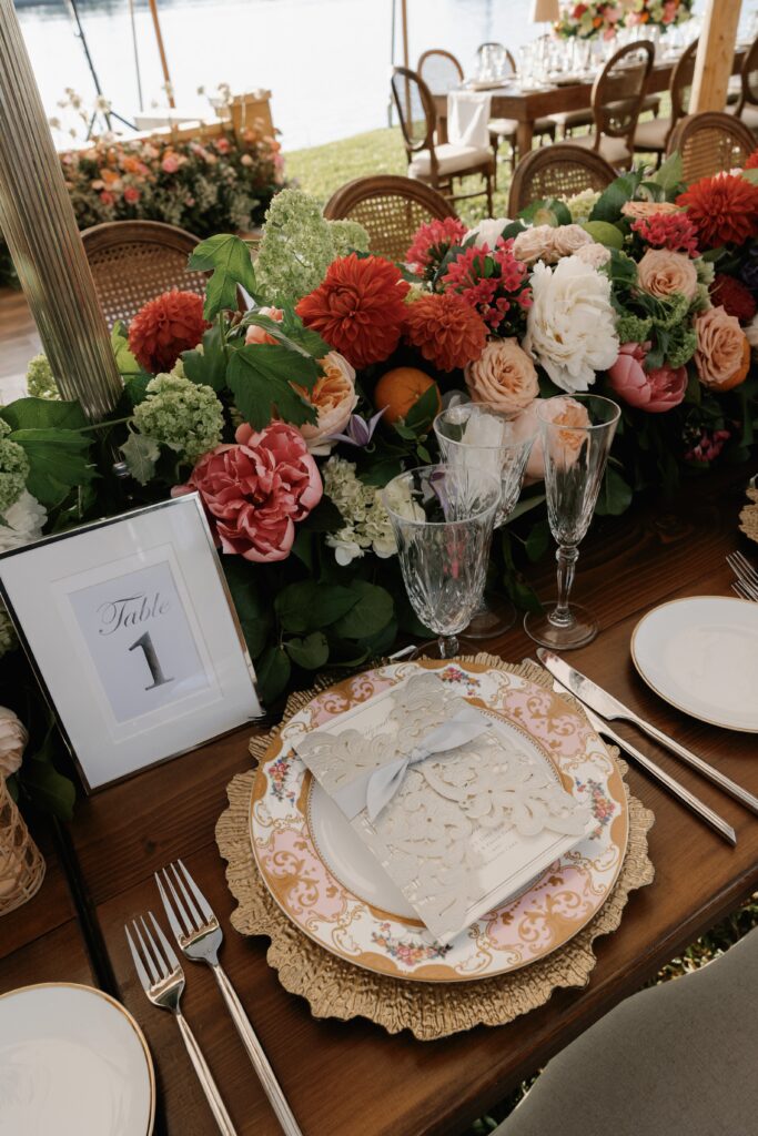 outdoor wedding table setting with colorful flowers during the best time to get married in florida, november to april
