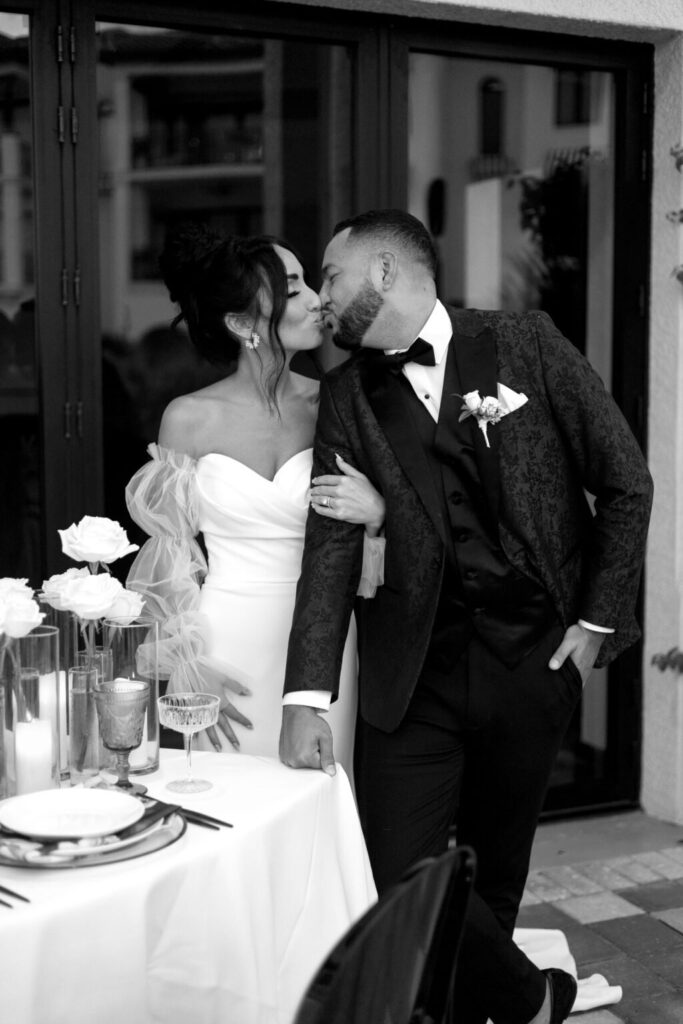 bride and groom kissing at their florida wedding reception venue