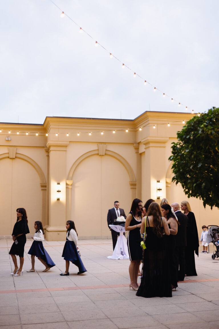 wedding guests mingling at the ritz carlton, a luxury outdoor wedding venue in naples,fl