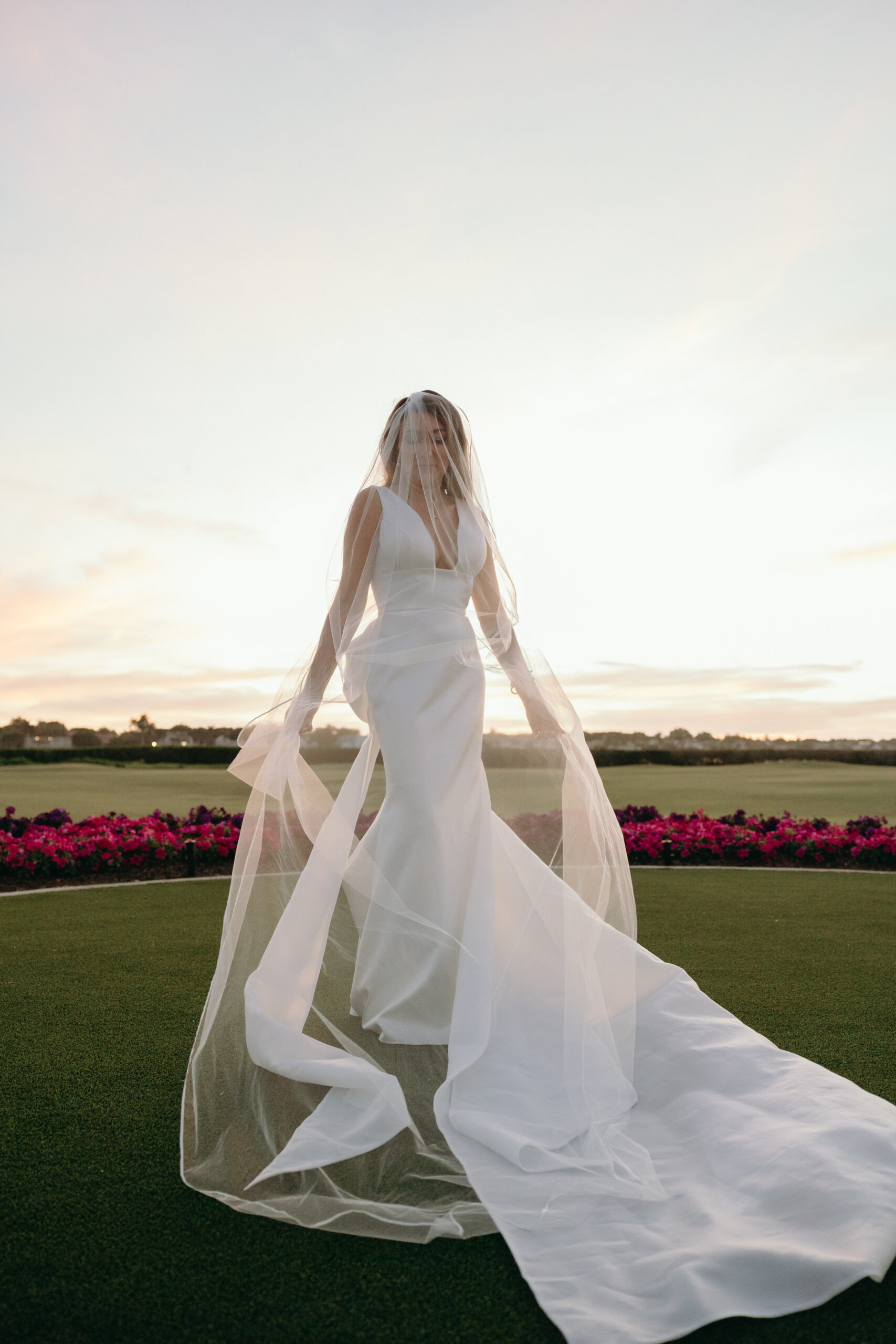 bridal portrait on the lawn at on of the best wedding reception venues in naples, fl