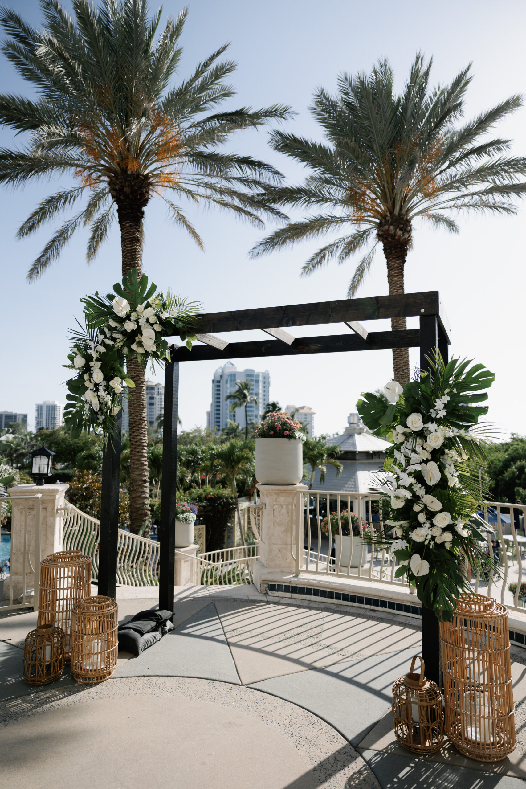 minimalist green and white floral setup by one of the most sought after wedding florists in naples, fl