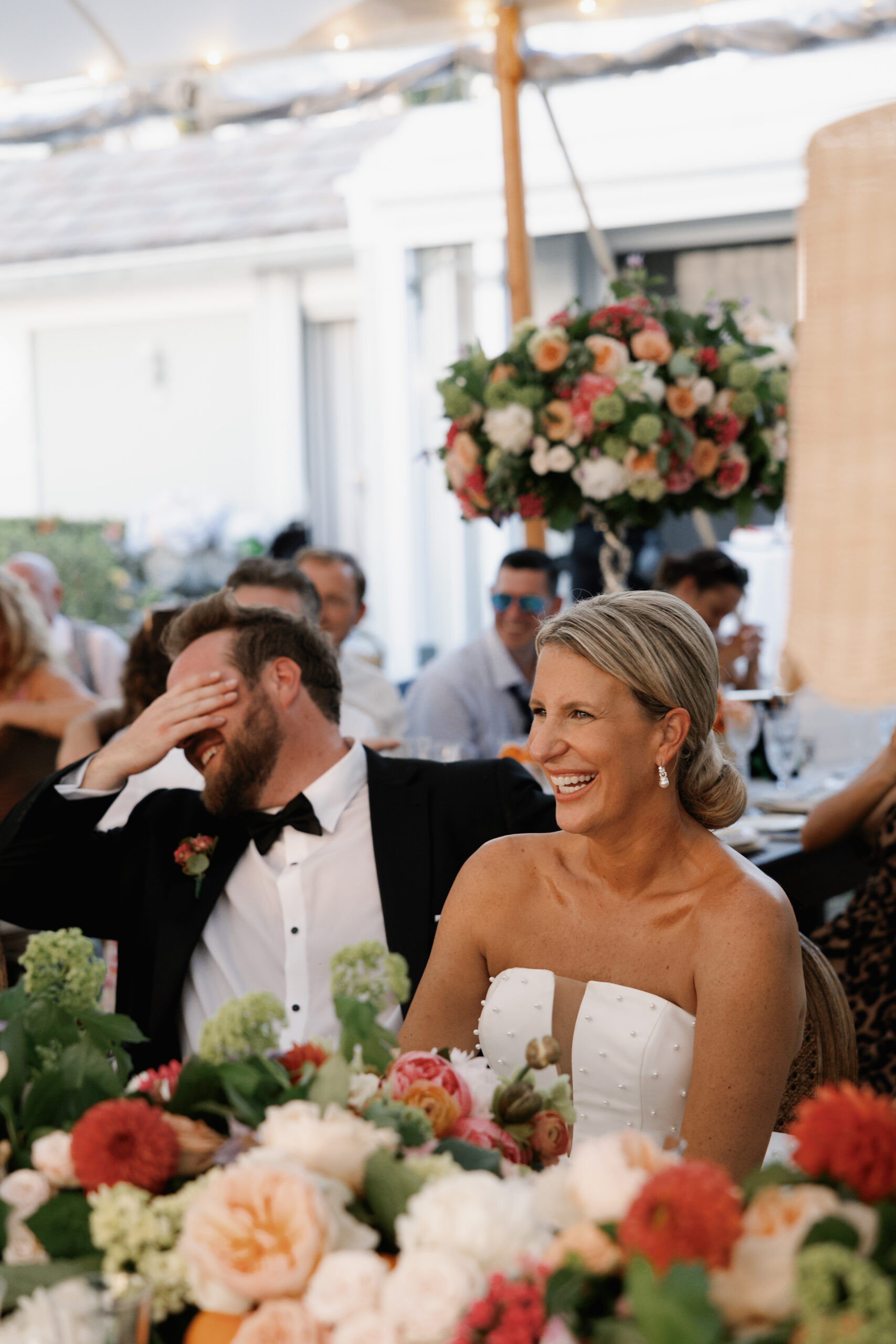 bride and groom enjoying their reception at their naples wedding